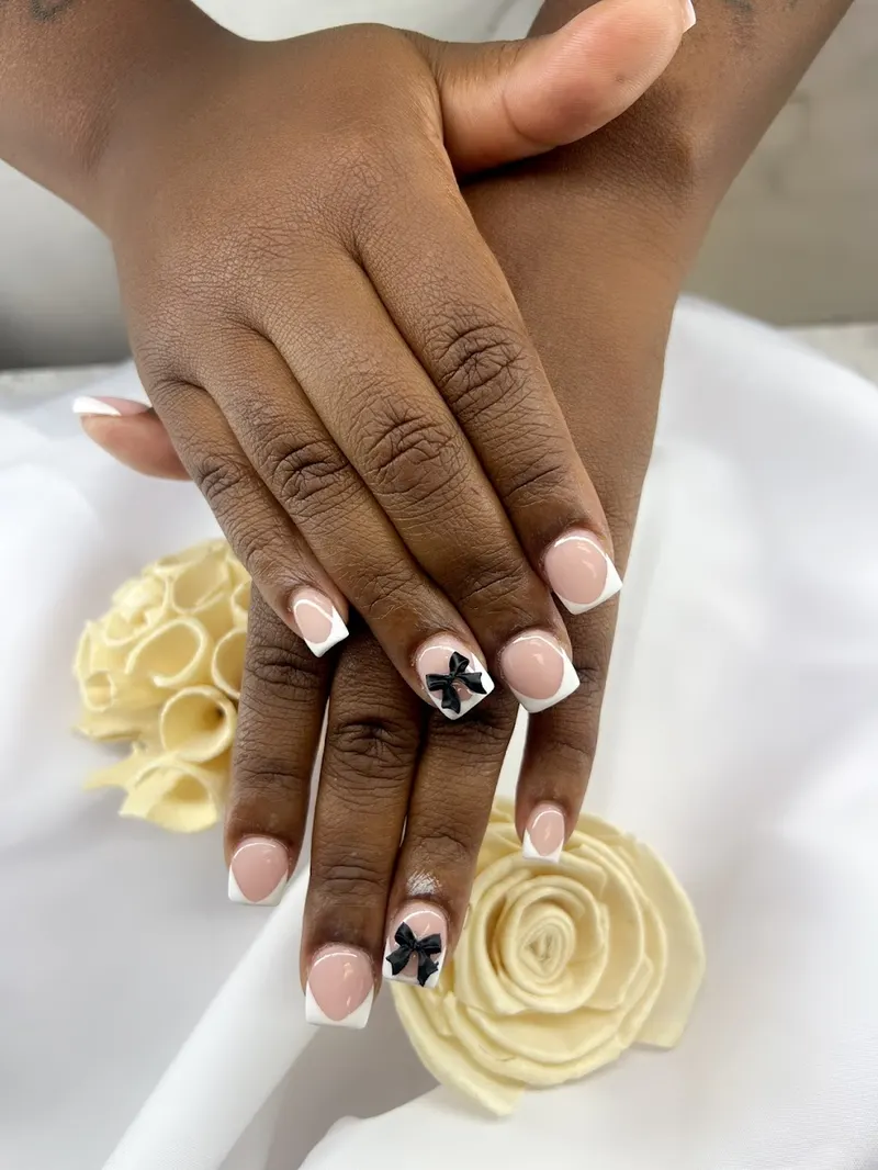 A glossy gel manicure in a soft neutral shade at Hien Vu Nails in Champaign, Illinois
